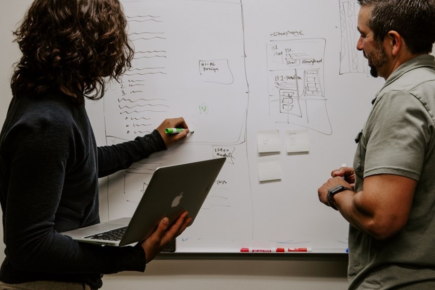 NYDIG, two people in front of a whiteboard